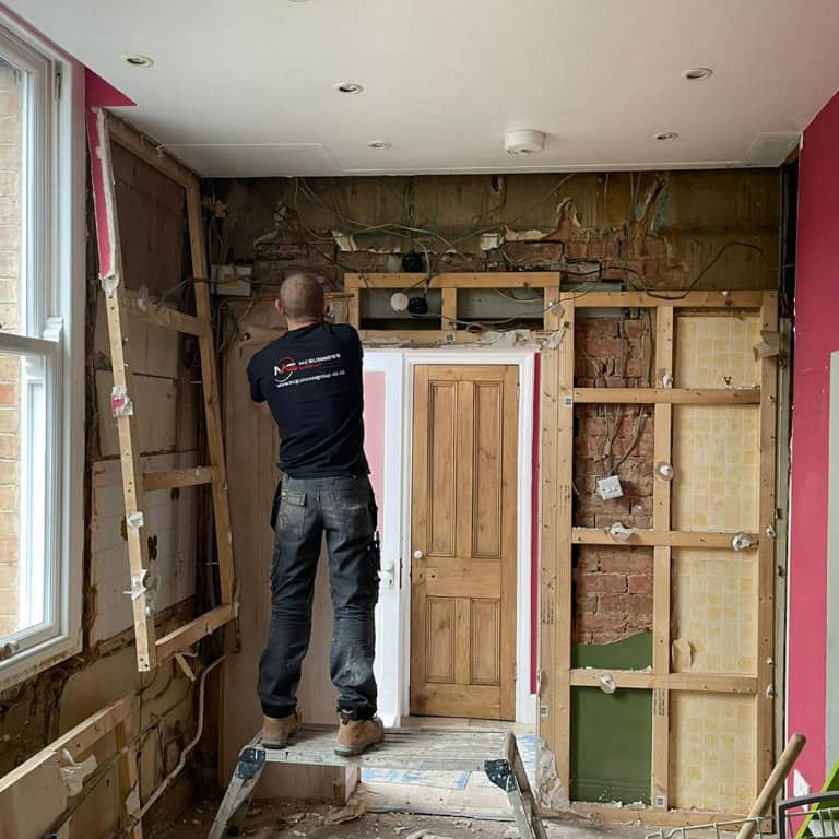 Builder ripping out a kitchen 